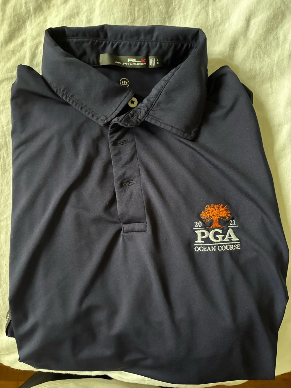 Ralph Lauren RLX Navy Polo with Orange Embroidered PGA Logo